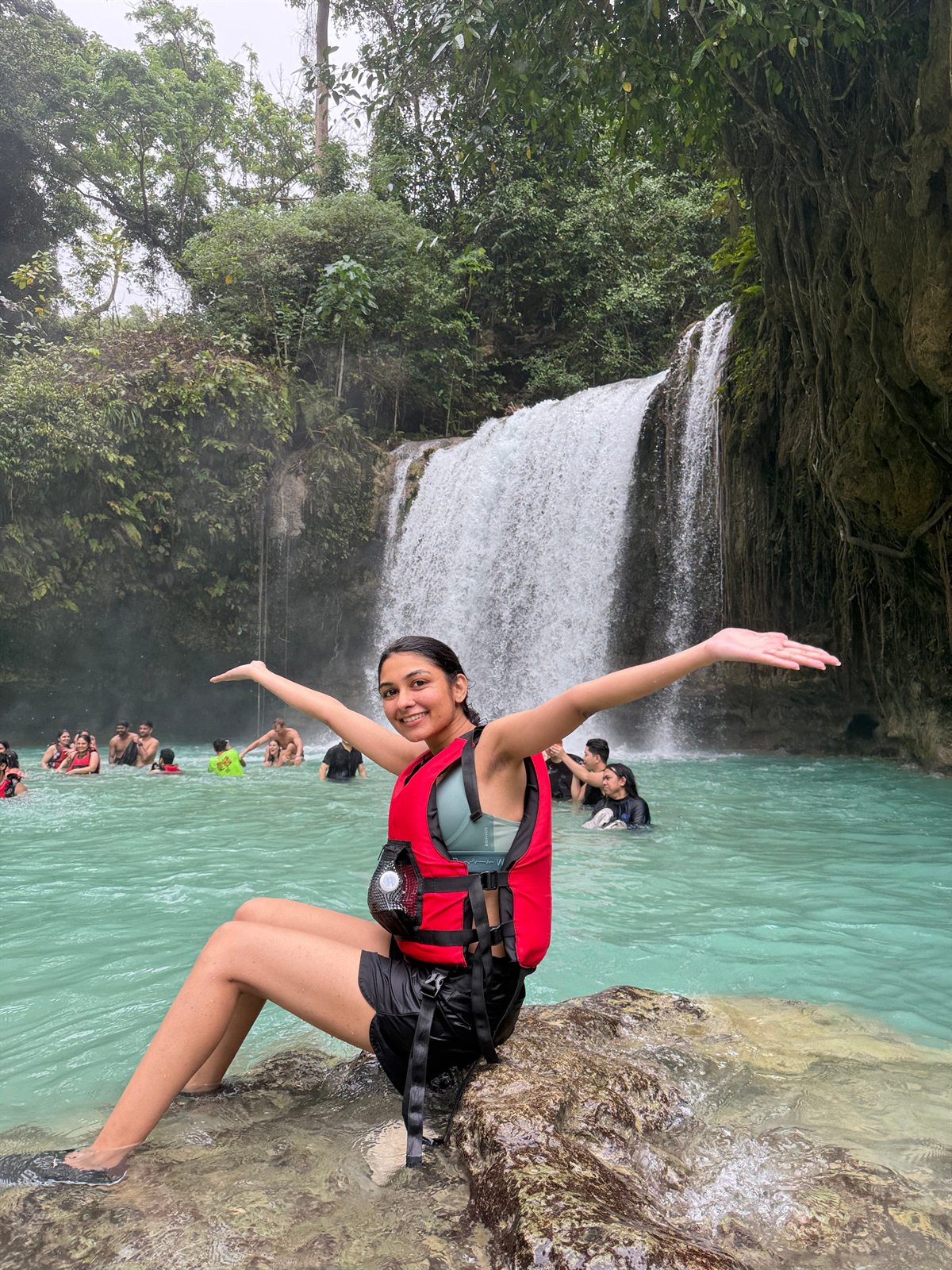 Waterfall swim on a group trip